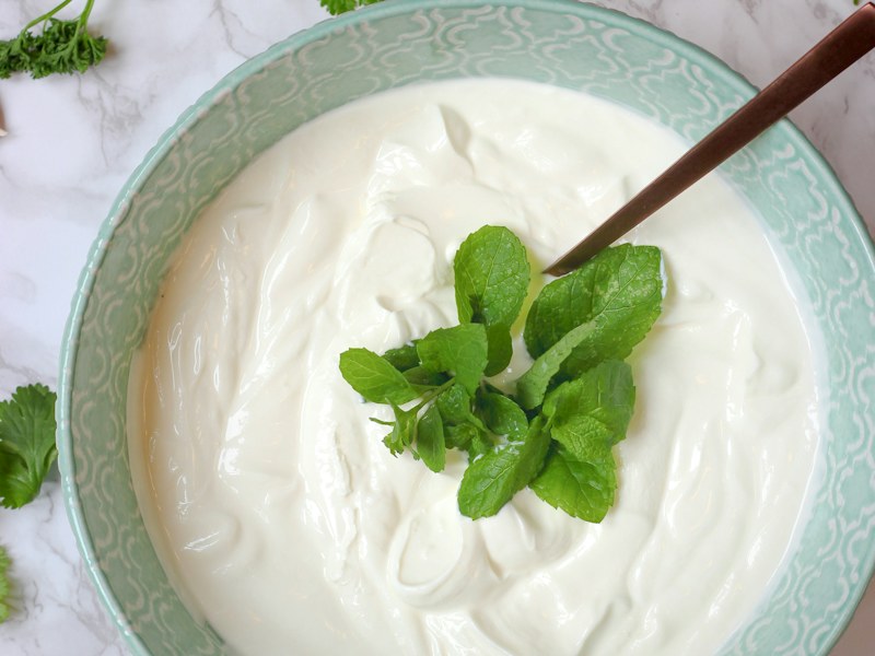 Bowl of yogurt providing calcium and phosphorus