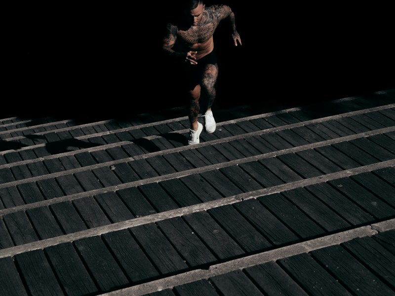 Man running up stairs as weight-bearing exercise